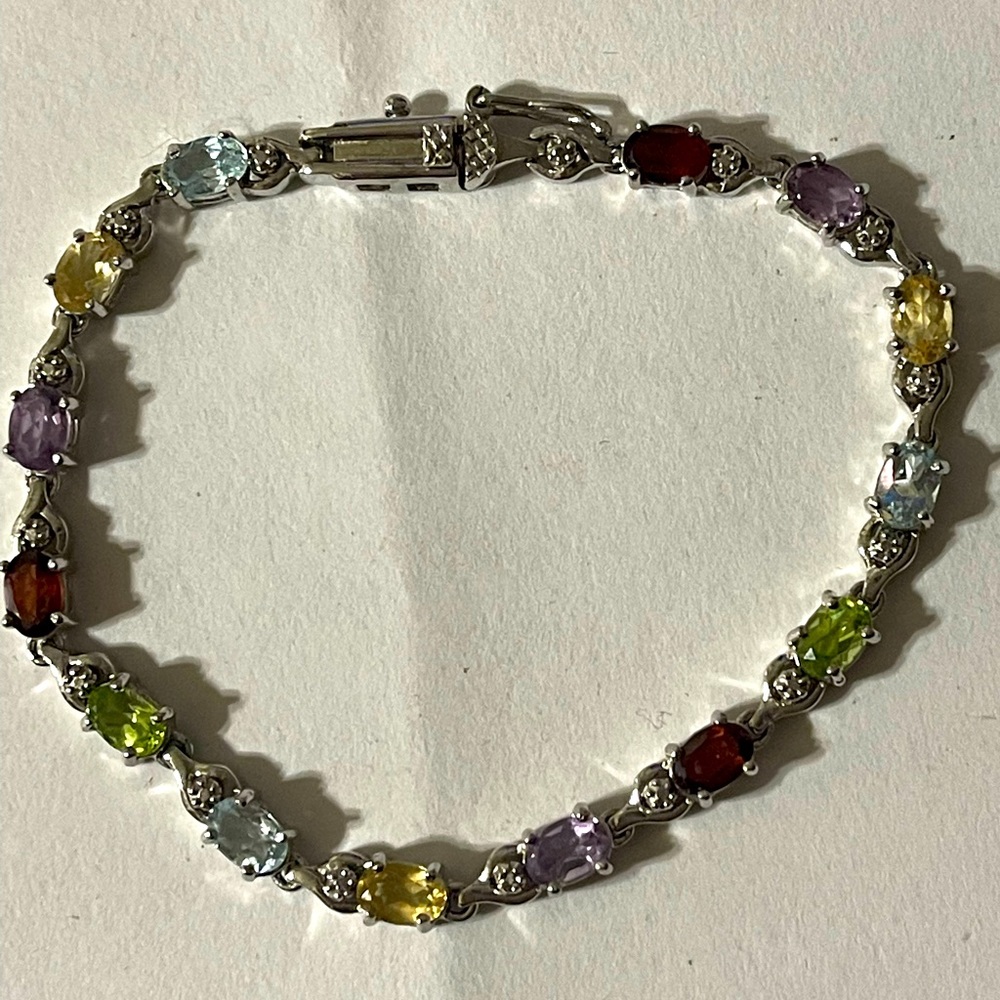 Women bracelets with multiple stones